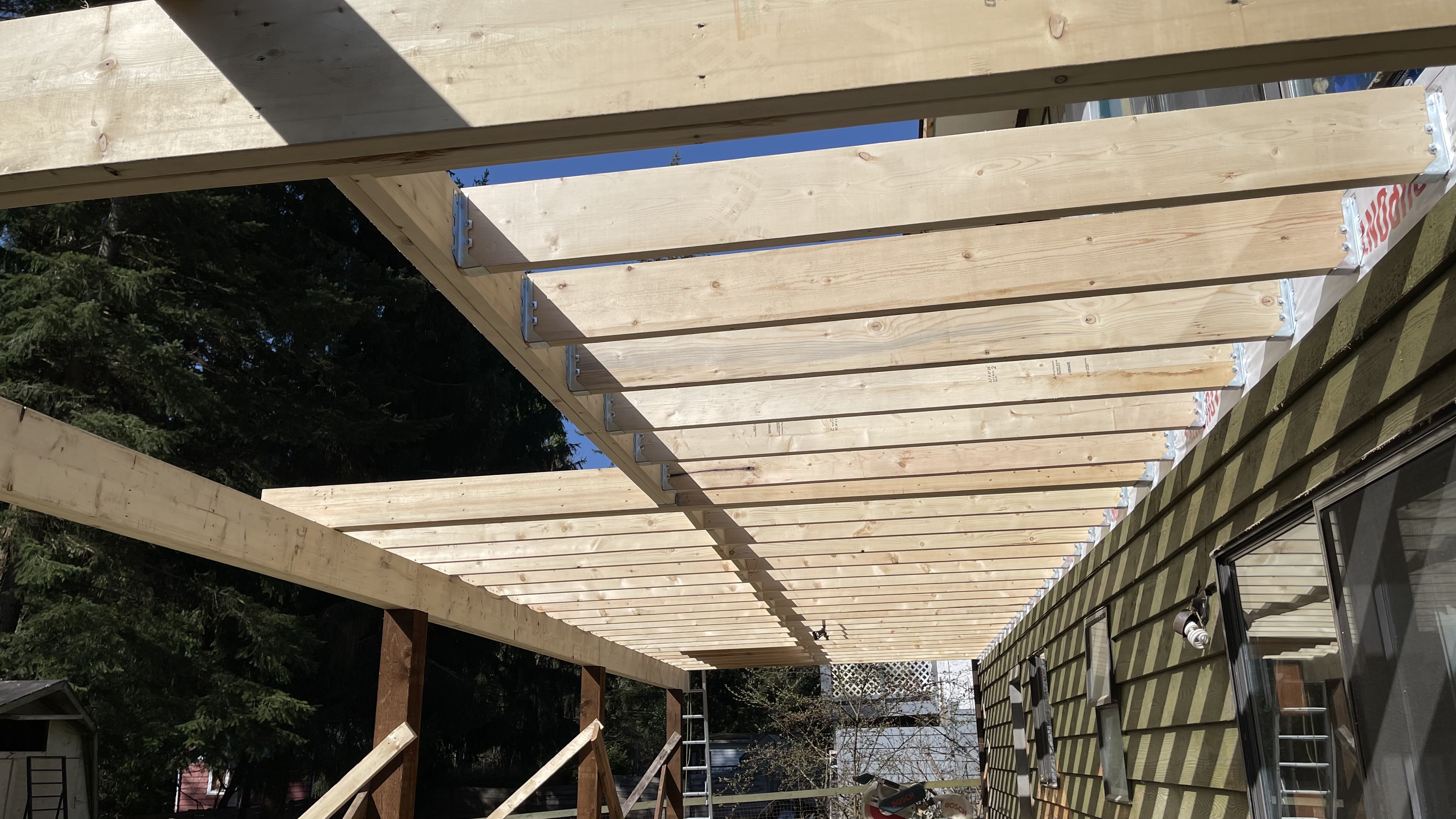 Covered deck framing built by Trevor Stephenson Construction Services in Victoria BC